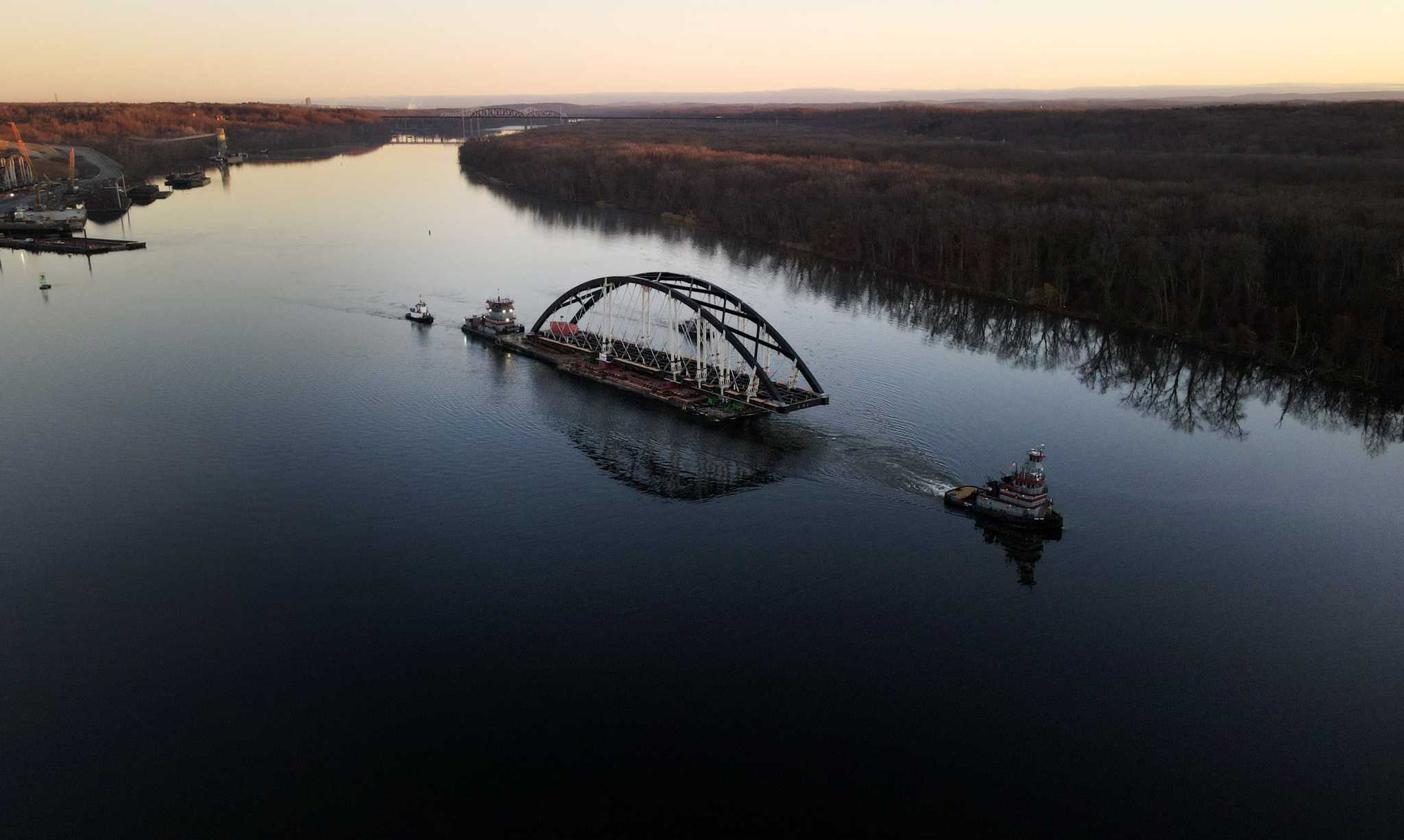 Photos: Bridge floats down the Hudson River