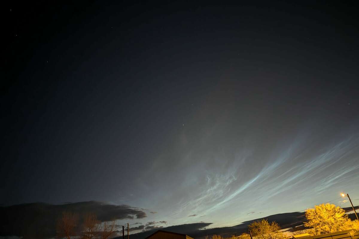 About six hours before Anthony Griffith spotted these noctilucent clouds from Van Horn, Texas, SpaceX launched 20 Starlink satellites from Vandenberg Space Force Base in California. 