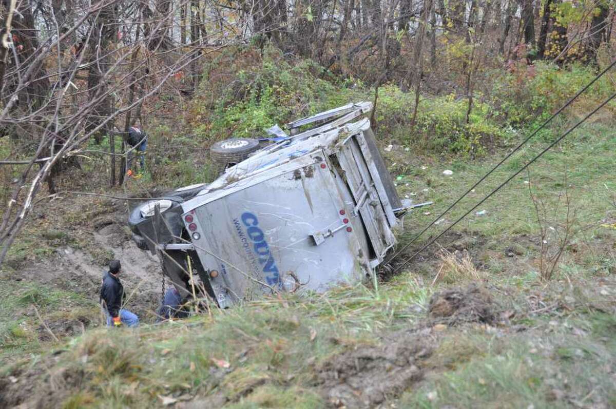 Outofcontrol trash truck crashes