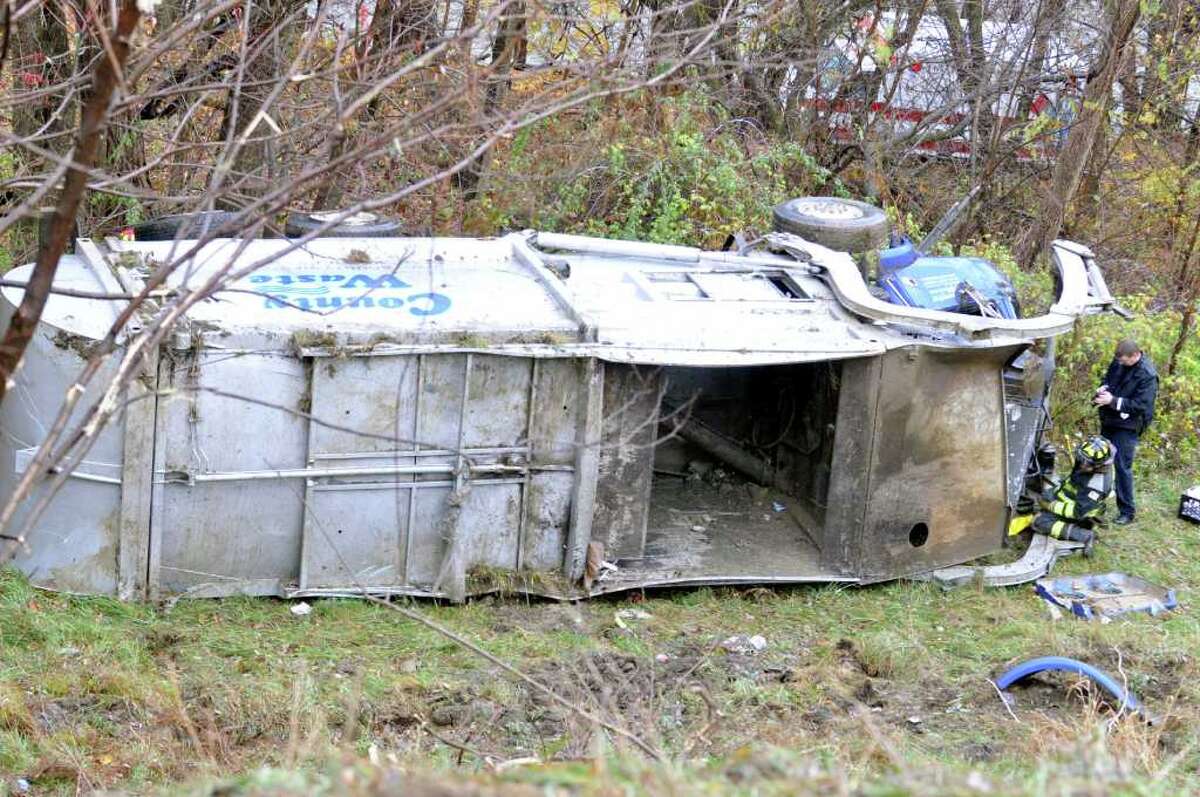 Outofcontrol trash truck crashes