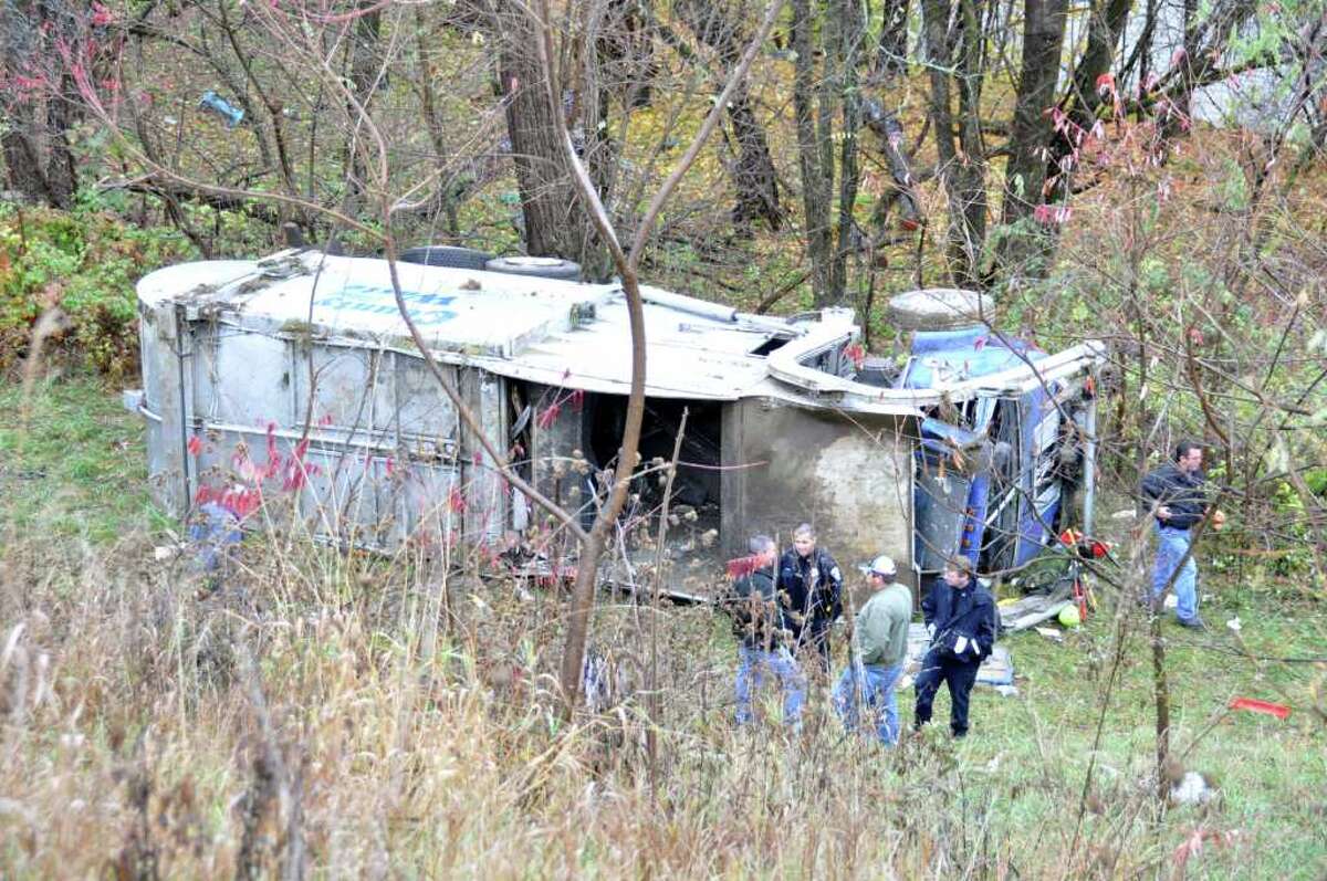 Outofcontrol trash truck crashes