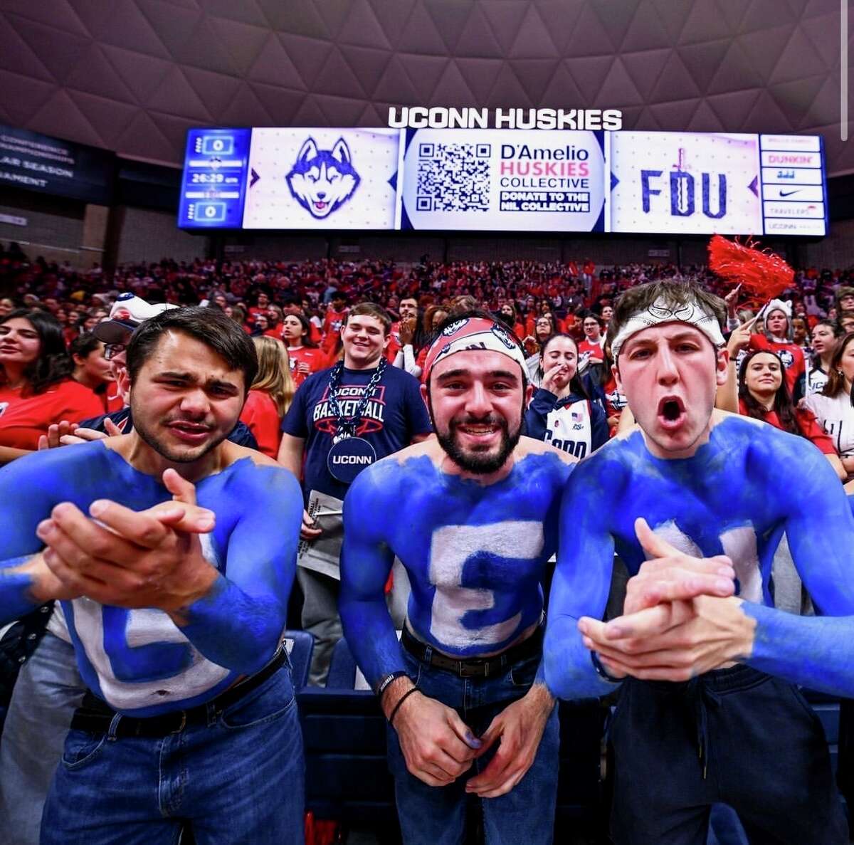 Meet The Students Who High-fived UConn's Geno Auriemma During Ceremony