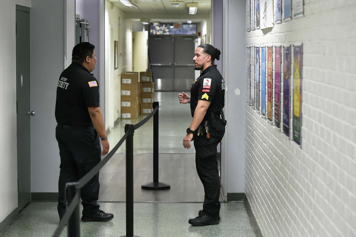 David Leon, right, Security Site Supervisor at West Rocks Middle School talks with Wilber Rendon, head security, on Thursday, November 21, 2024, Norwalk, Conn.