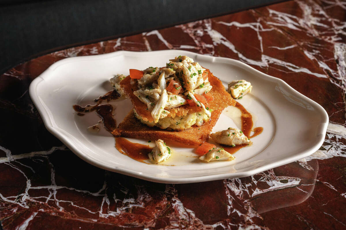 New entrees include the Crab Napoleon, which is part of Andiron's casual 'wallet-friendly' concept.