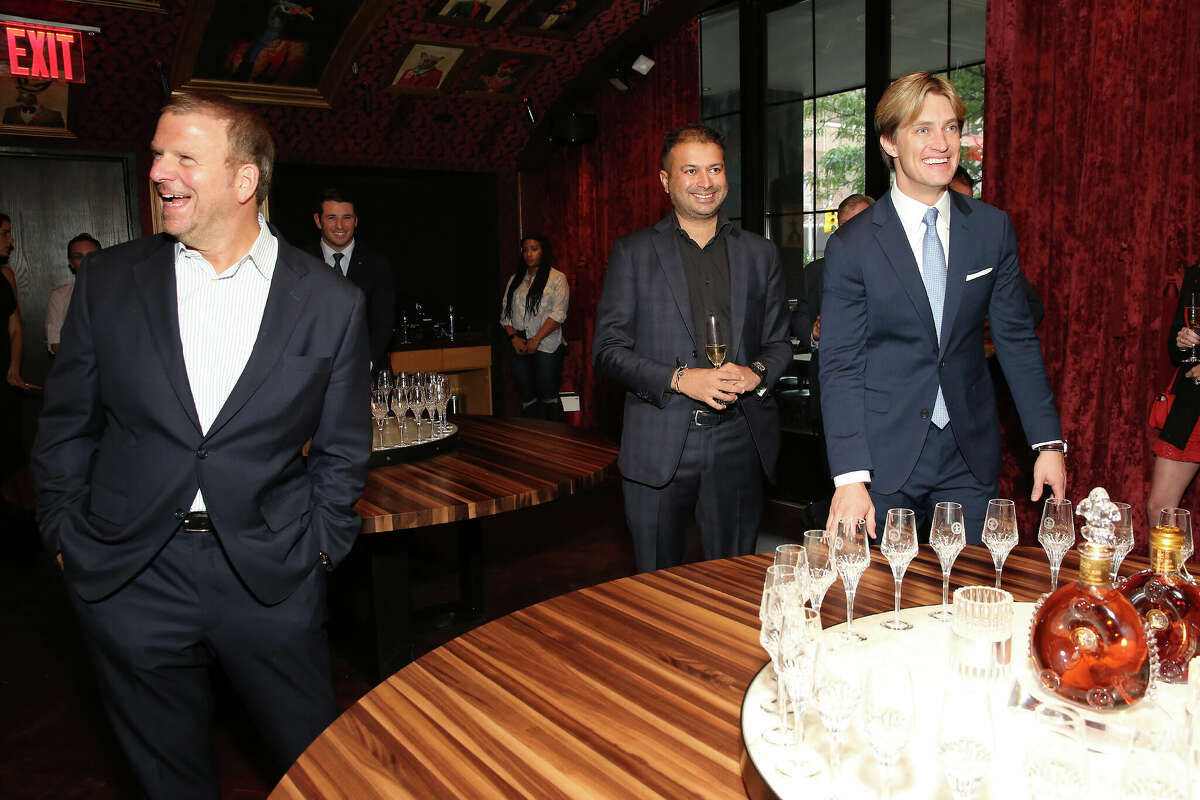 Tilman Fertitta, left, pictured in 2019. The Houston billionaire purchased an iconic New York City steakhouse this week.