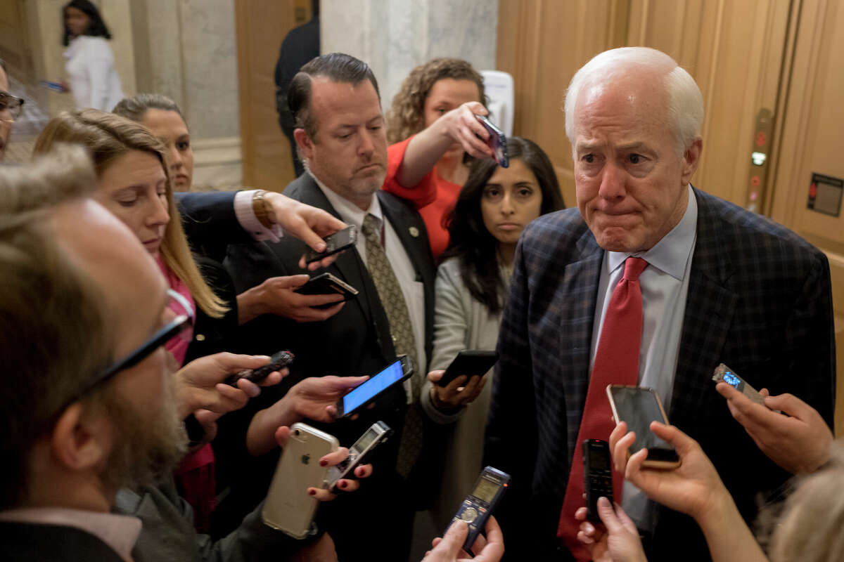 Sen. John Cornyn (R-TX) walks out of the senate on Capitol Hill on January 21, 2018 in Washington, DC. Cornyn is one of several congressmen working to establish the Senate DOGE Caucus.