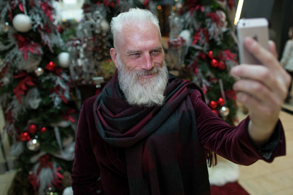 Fashion Santa, played by model Paul Mason, has been touring the globe over the last several years spreading holiday cheer while wearing top labels.