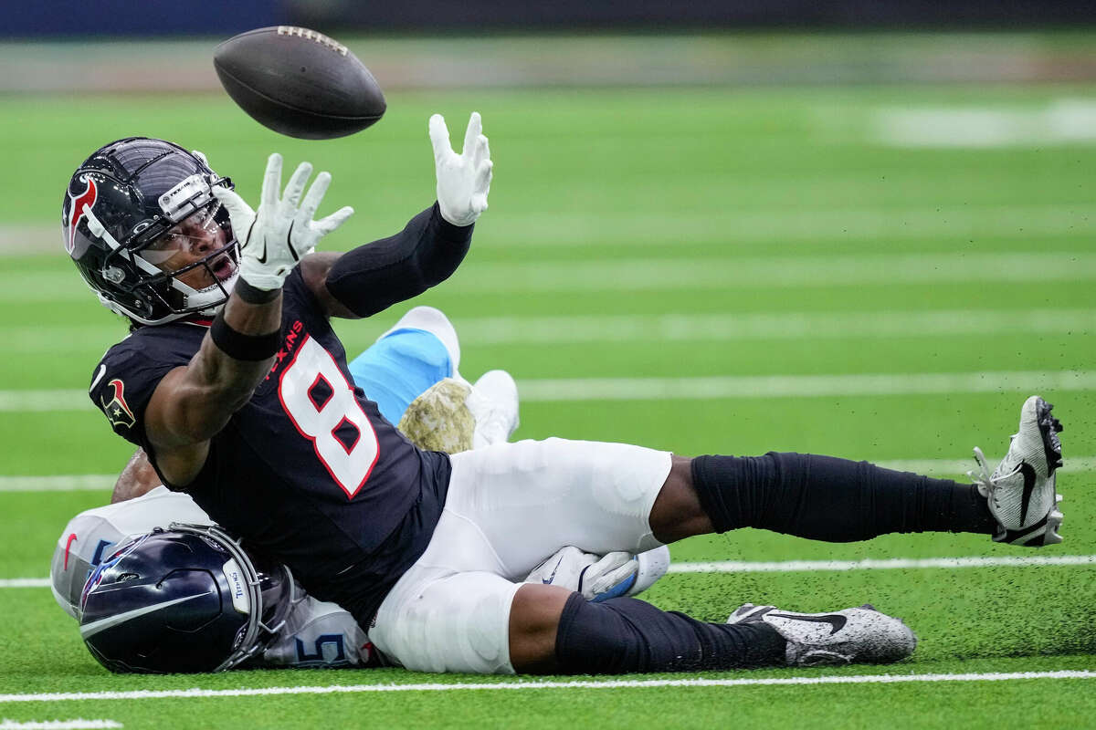 Tennessee Titans cornerback Daryl Worley (35) breaks up a pass intended for Houston Texans wide receiver John Metchie III (8) during the second half of an NFL football game Sunday, Nov. 24, 2024, in Houston.