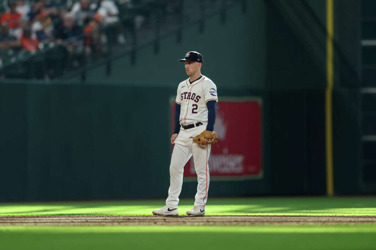 HOUSTON, TEXAS - JUNE 15: Alex Bregman #2 of the Houston Astros stands on the infield in the ninth inning against the Detroit Tigers at Minute Maid Park on June 15, 2024 in Houston, Texas. (Photo by Tim Warner/Getty Images)