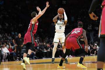 Lillard Scores 37 Points And Giannis-less Bucks Hold Off Heat 106-103 ...