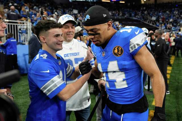 Lions Injured DE Aidan Hutchinson Surprises 20-year-old Marine With 4 ...