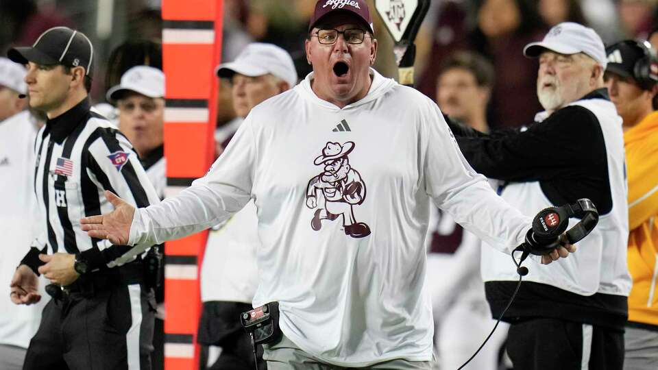 Texas A&M head coach Mike Elko reacts after Texas defensive back Andrew Mukuba isn’t called for targeting against wide receiver Jabre Barber during the first half of an NCAA college football game at Kyle Field, Saturday, Nov. 30, 2024, in College Station.