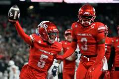 Williams Accounts For 3 TDs, No. 21 UNLV Beats Nevada 38-14 To Make ...