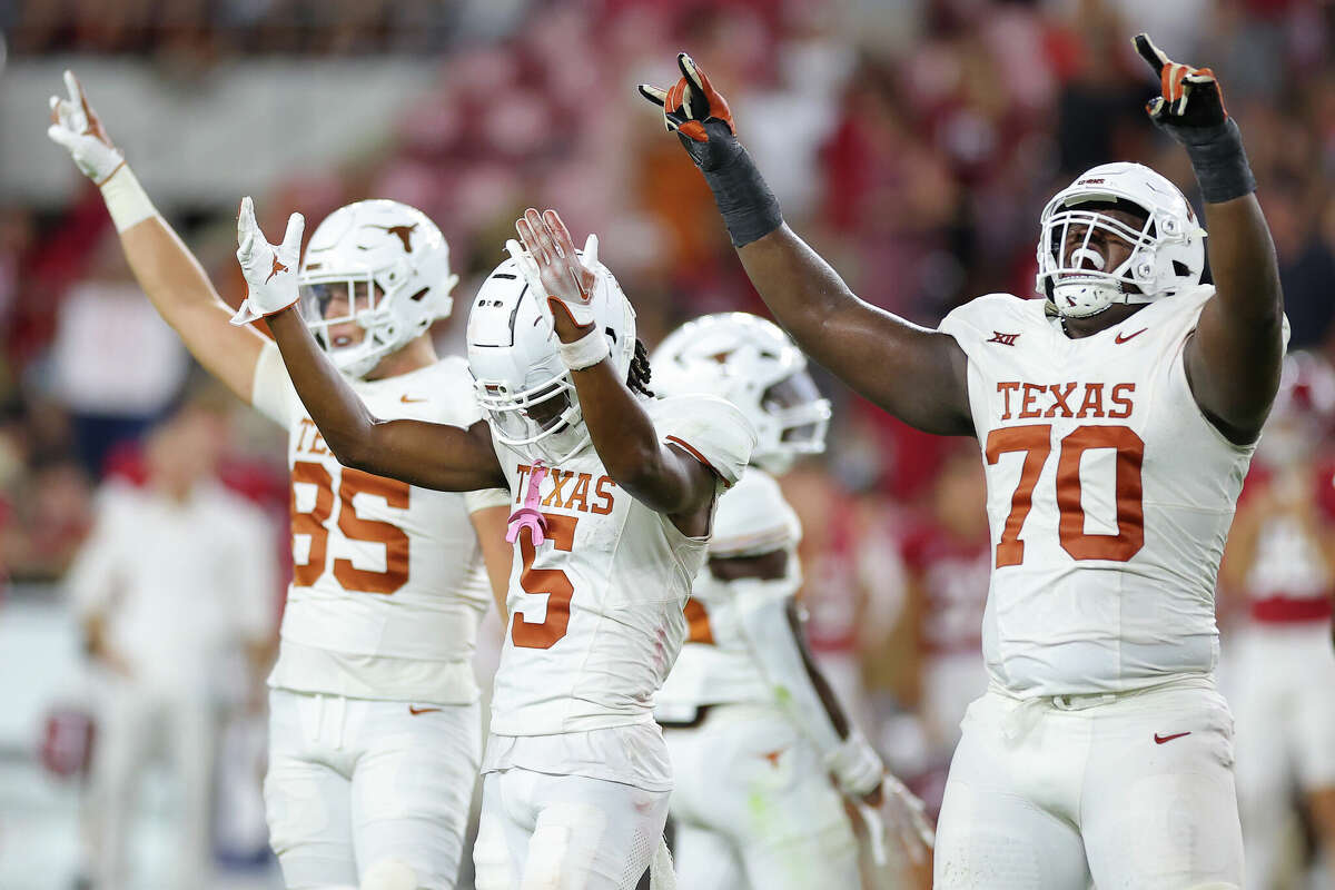 TUSCALOOSA, ALABAMA - SEPTEMBER 09: Adonai Mitchell #5 of the Texas Longhorns celebrates with teammates after defeating the Alabama Crimson Tide 34-24 at Bryant-Denny Stadium on September 09, 2023 in Tuscaloosa, Alabama. (Photo by Kevin C. Cox/Getty Images)