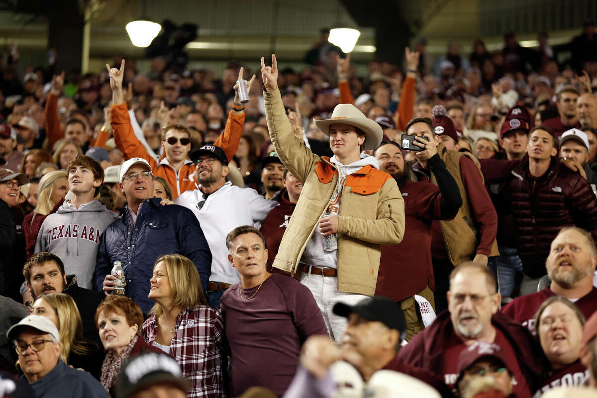 Texas Longhorns fans cheer prior to a game against the Texas A&M Aggies at Kyle Field on November 30, 2024 in College Station, Texas. 