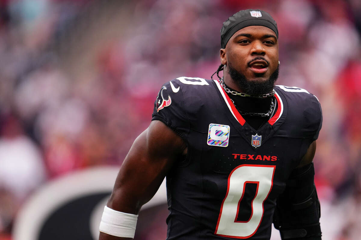 HOUSTON, TX - SEPTEMBER 29: Azeez Al-Shaair #0 of the Houston Texans runs out of the tunnel prior to an NFL football game against the Jacksonville Jaguars at NRG Stadium on September 29, 2024 in Houston, Texas. (Photo by Cooper Neill/Getty Images)