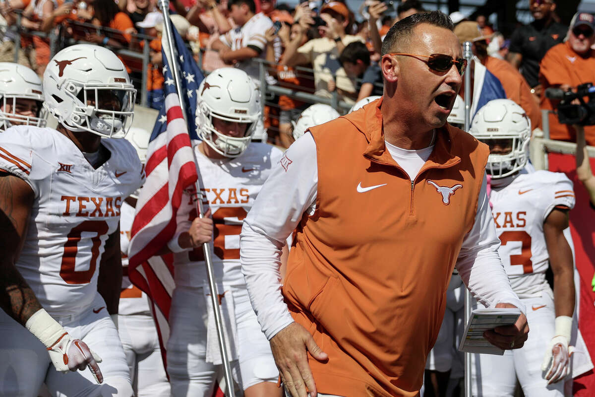 HOUSTON, TEXAS - OCTOBER 21: Head coach Steve Sarkisian of the Texas Longhorns leads the team to the field before the game against the Houston Cougars at TDECU Stadium on October 21, 2023 in Houston, Texas. (Photo by Tim Warner/Getty Images)