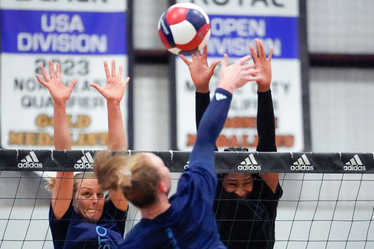 Karin Palgutova, left, and Amber Igiede go up for a block during a workout of LOVB Houston Volleyball on Tuesday, Dec. 3, 2024 in Houston. League One Volleyball is Houston's new pro volleyball team is launching in January with multiple Olympians on board as part of a single-entity league with a unique grassroots structure.
