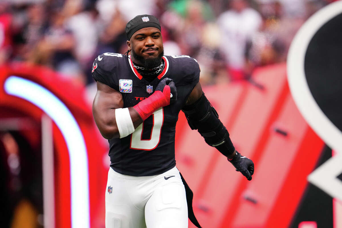 HOUSTON, TX - SEPTEMBER 29: Azeez Al-Shaair #0 of the Houston Texans runs out of the tunnel prior to an NFL football game against the Jacksonville Jaguars at NRG Stadium on September 29, 2024 in Houston, Texas. (Photo by Cooper Neill/Getty Images)