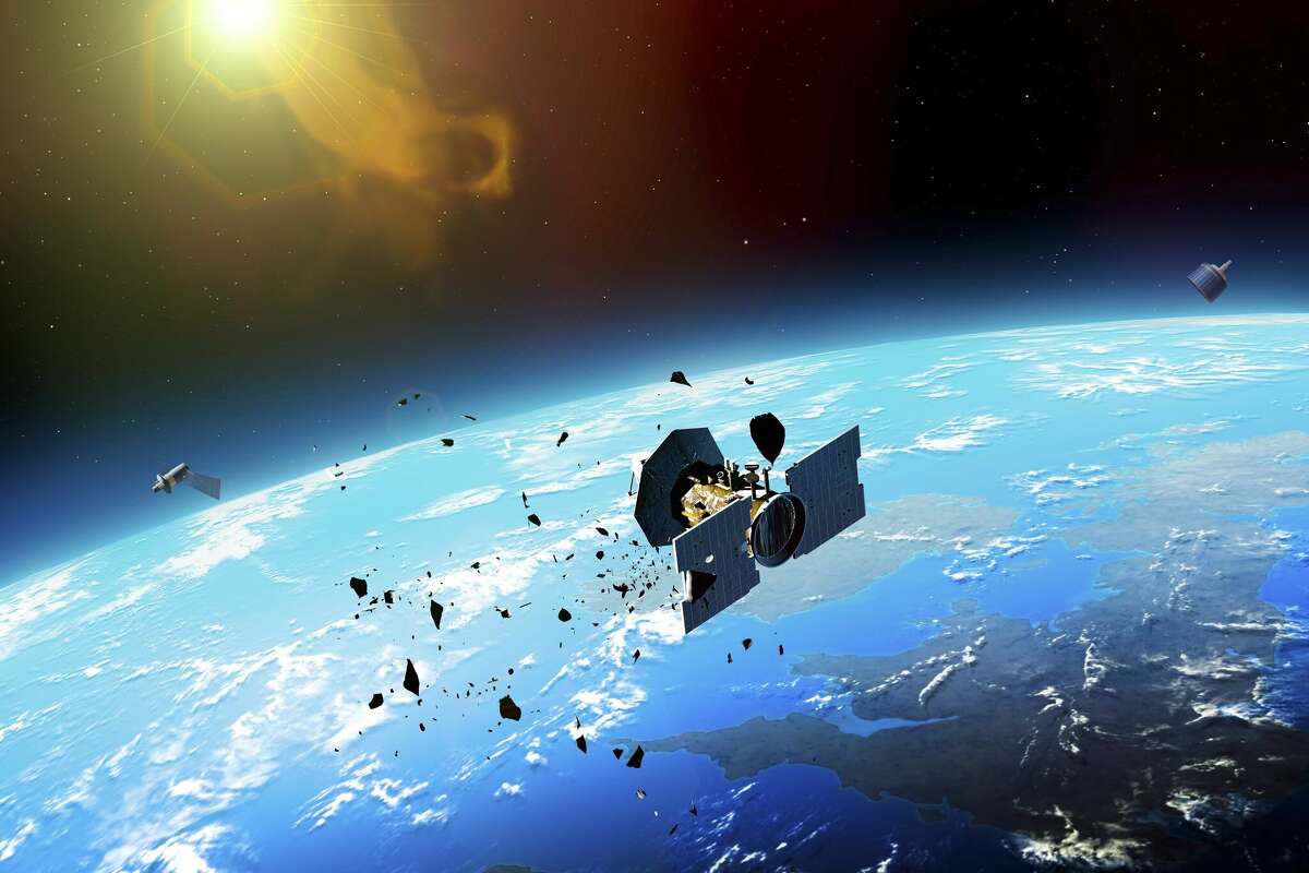 Artwork shows the potential dangers fro satellites in low-Earth orbit. Three CubeSats in low-Earth orbit recently met their demise due to increased solar activity. 