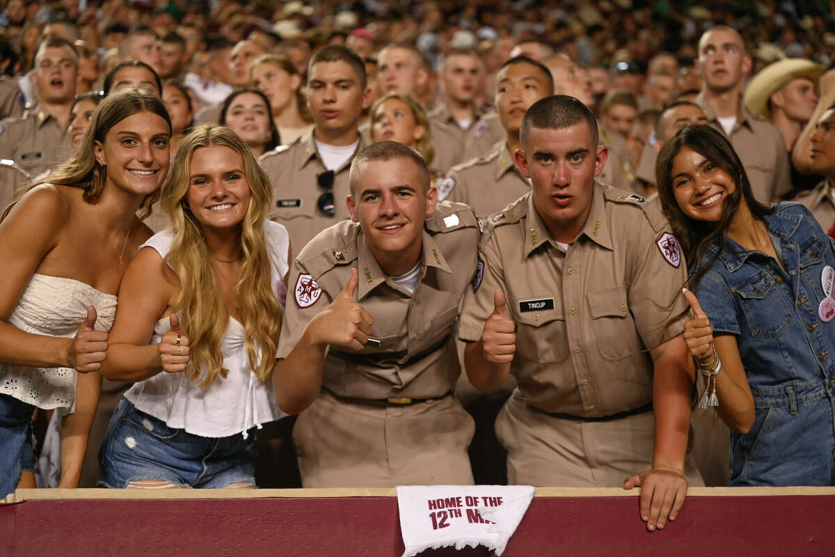 COLLEGE STATION, TEXAS - AUGUST 31: Texas A&M Aggies fans pose during the game against the Notre Dame Fighting Irish in the fourth quarter at Kyle Field on August 31, 2024 in College Station, Texas. (Photo by Jack Gorman/Getty Images)