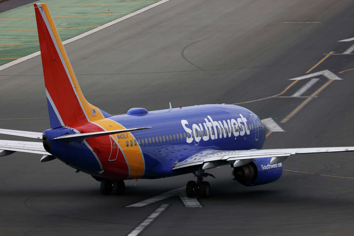 A Southwest Airlines Boeing 737 aircraft taxis on the runway at San Diego International Airport for a departure for Las Vegas on November 18, 2024 in San Diego, California. 