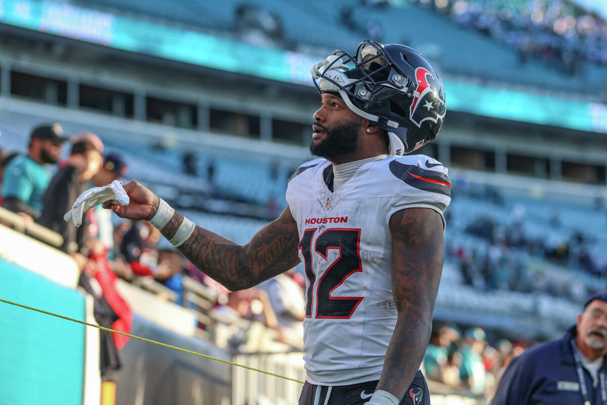 Houston Texans wide receiver Nico Collins (12) walks off the field after an NFL football game against the Jacksonville Jaguars, Sunday, Dec. 1, 2024, in Jacksonville, Fla. The Texans defeated the Jaguars 23-20. 