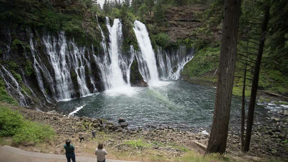 Burney Falls water comes from underground springs above and at the falls, which are 129 feet high, and provides an almost constant flow rate even during the dry summer months. Tuesday, May 30 2017, Burney, CA. The falls were called 'the Eighth Wonder of the World' by President Theodore Roosevelt