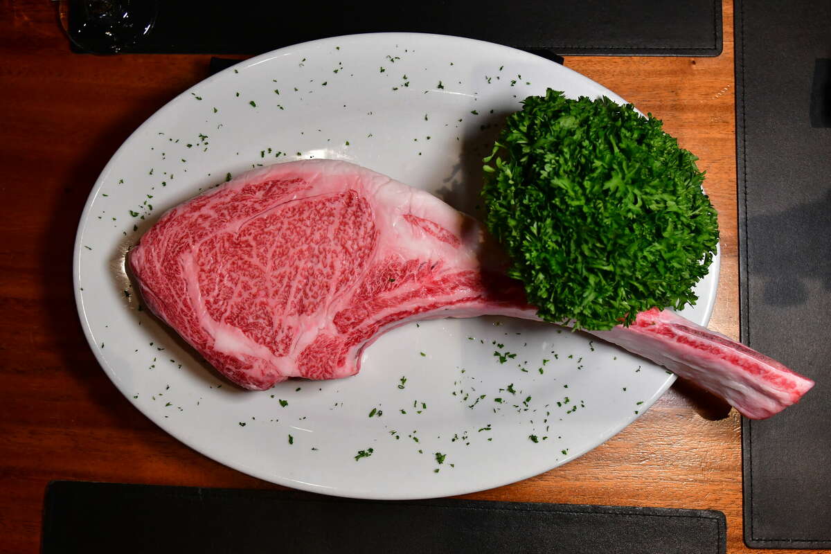 The $1,000 Japanese A5 wagyu bone-in ribeye at Mastro's Steakhouse in Houston, Texas. Tilman Fertitta's Post Oak Hotel restaurant is the first in Texas to offer this cut of prized Japanese beef.