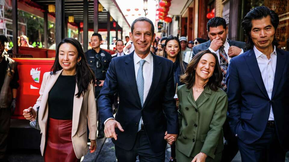 Mayor- Elect Daniel Lurie does a walk through Chinatown after speaking at St. Mary’s Square a day after winning the Mayoral race in San Francisco on Friday, Nov. 8, 2024.