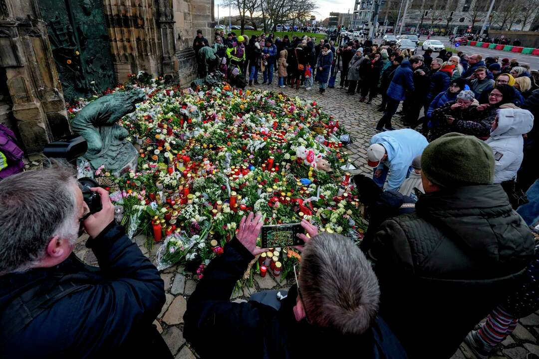 Germans mourn the 5 killed and 200 injured in the apparent attack on a