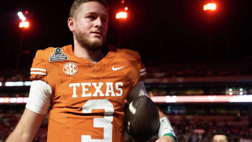 Texas quarterback Quinn Ewers (3) leaves the field after the team’s 38-24 win over Clemson during a first round college football playoff game at Darrell K Royal-Texas Memorial Stadium, Saturday, Dec. 21, 2024, in Austin.