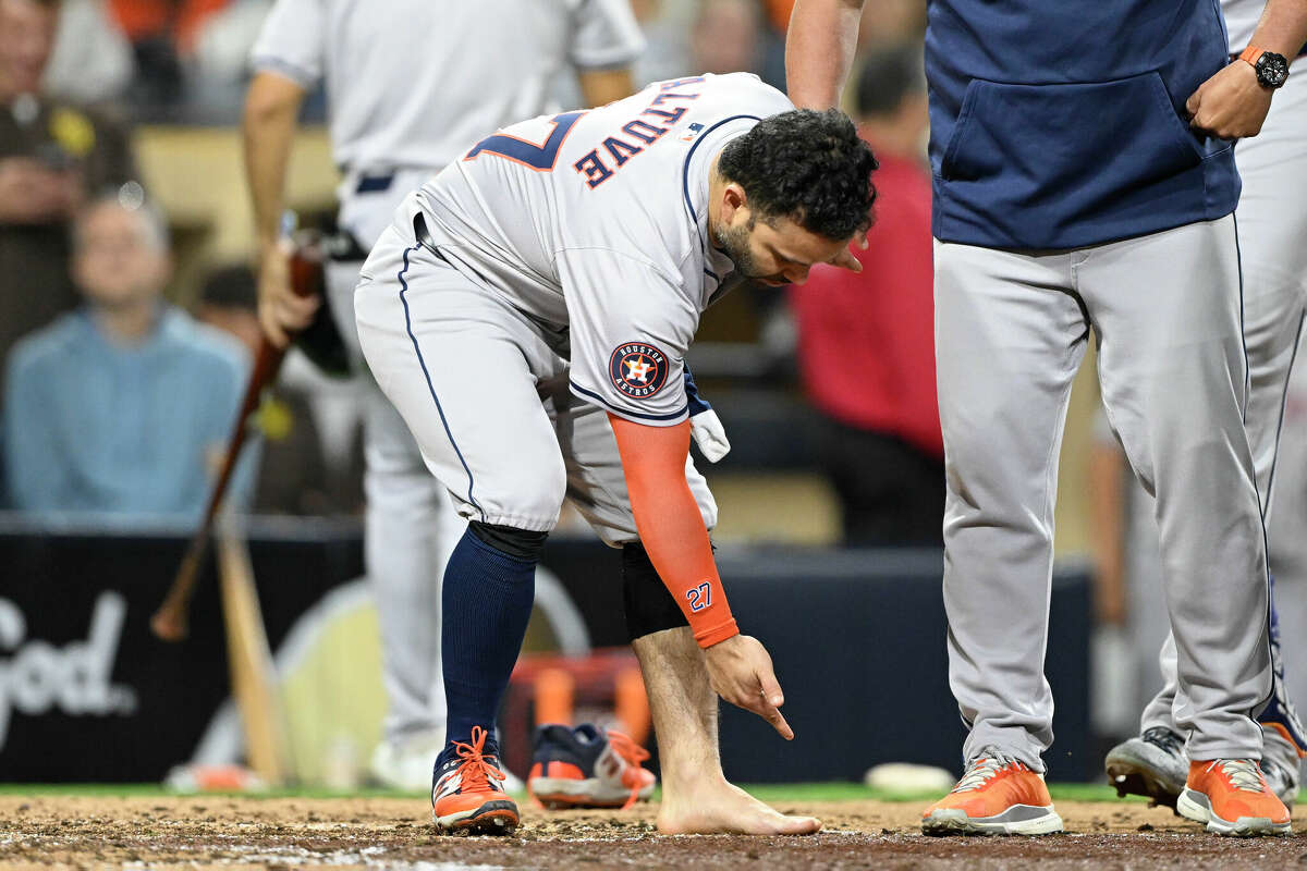 SAN DIEGO, CA - SEPTEMBER 17: Jose Altuve #27 of the Houston Astros points to his foot after grounding out during the ninth inning of a baseball game against the San Diego Padres at Petco Park on September 17, 2024 in San Diego, California. (Photo by Denis Poroy/Getty Images)