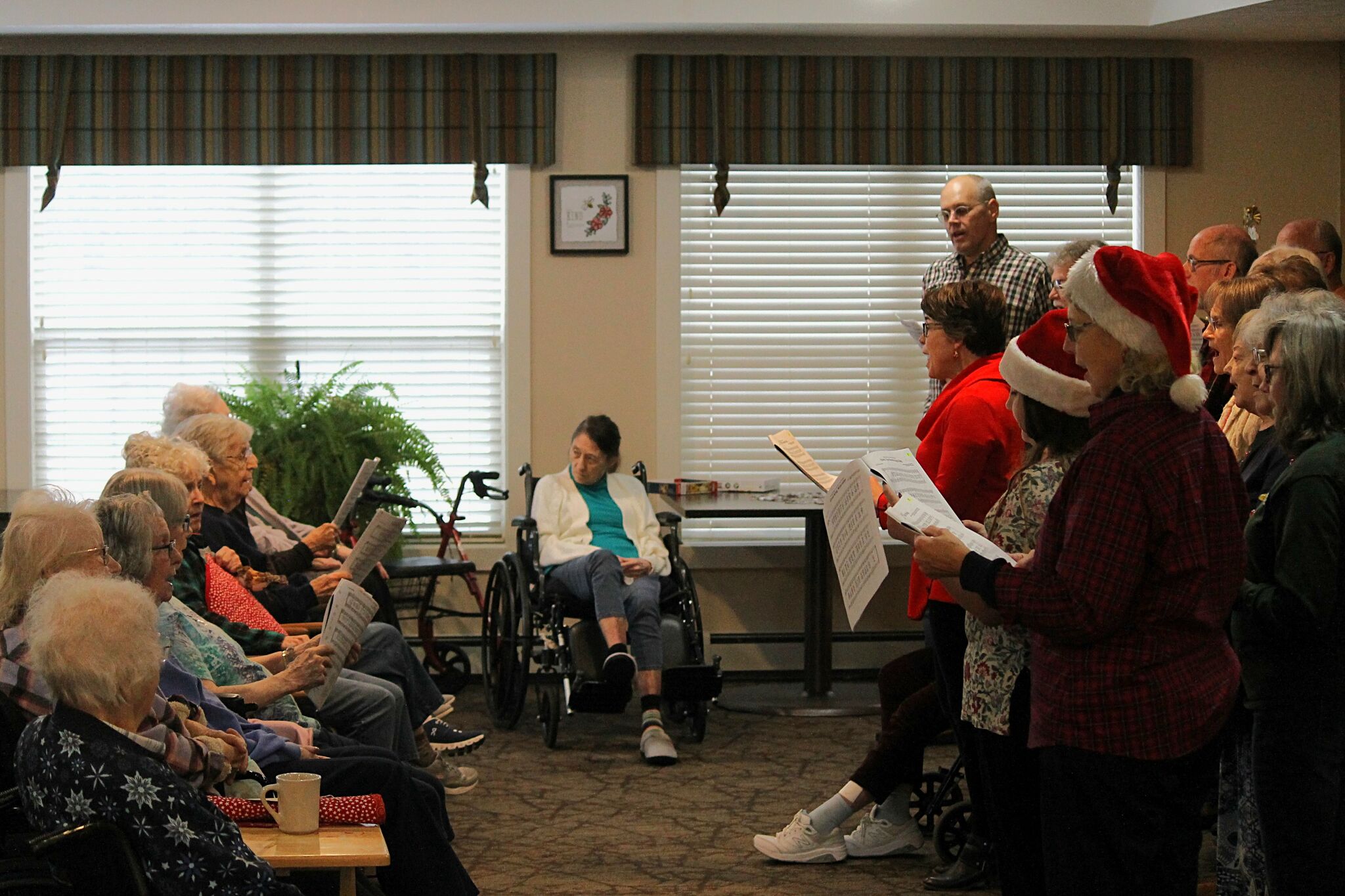 Christmas carolers bring holiday cheer to Manistee seniors