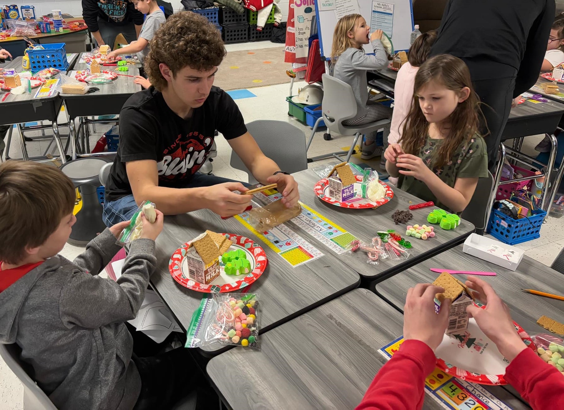 Gingerbread Students Betsie Valley students create gingerbread houses with NHS help