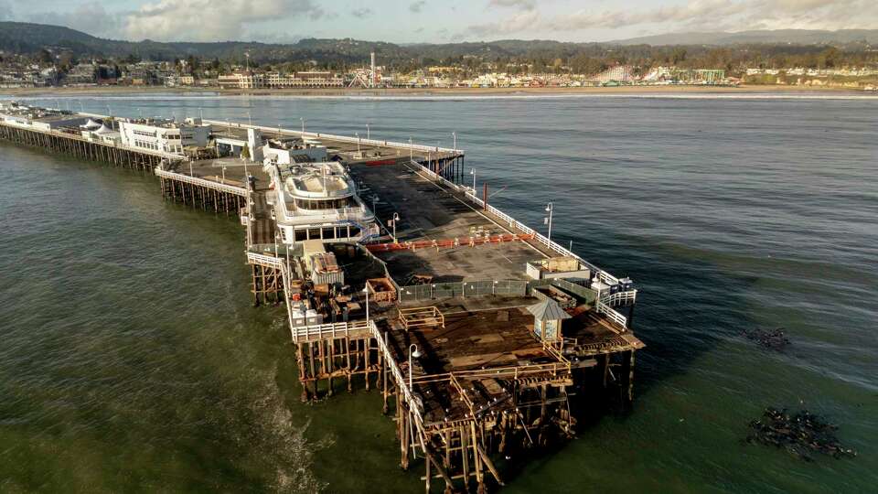 The damaged Santa Cruz Wharf is seen after the section of the pier fell into the ocean during high surf the previous day, in Santa Cruz, Calif., Tuesday, Dec. 24, 2024.