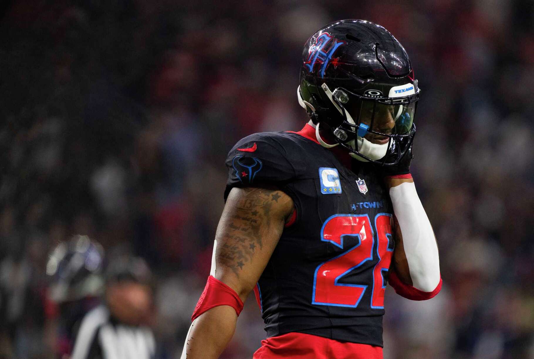 Houston Texans running back Joe Mixon (28) walks off the field after coming up short on fourth down, one yard from the goal line during the first half of an NFL football game, Wednesday, Dec. 25, 2024, in Houston.