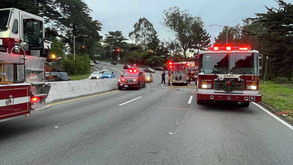 A photo shared by the San Francisco Fire Department shows firefighters responding to a crash at 19th Avenue and Crossover Drive that led to one fataility. California Highway Patrol shows showy road conditions on Highway 80 through the Lake Tahoe area on Dec. 24, 2024.