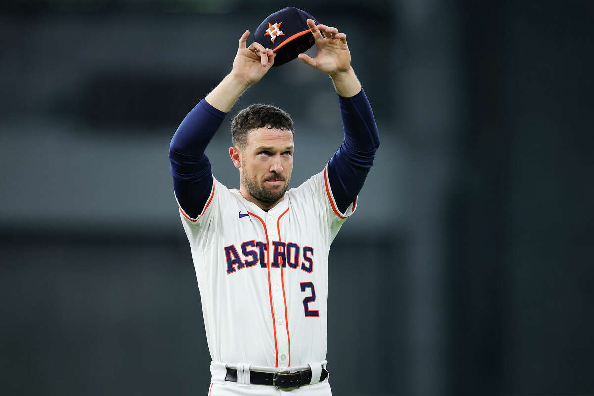 HOUSTON, TEXAS - OCTOBER 01: Alex Bregman #2 of the Houston Astros waves to fans prior to playing the Detroit Tigers in Game One of the Wild Card Series at Minute Maid Park on October 01, 2024 in Houston, Texas. (Photo by Alex Slitz/Getty Images)