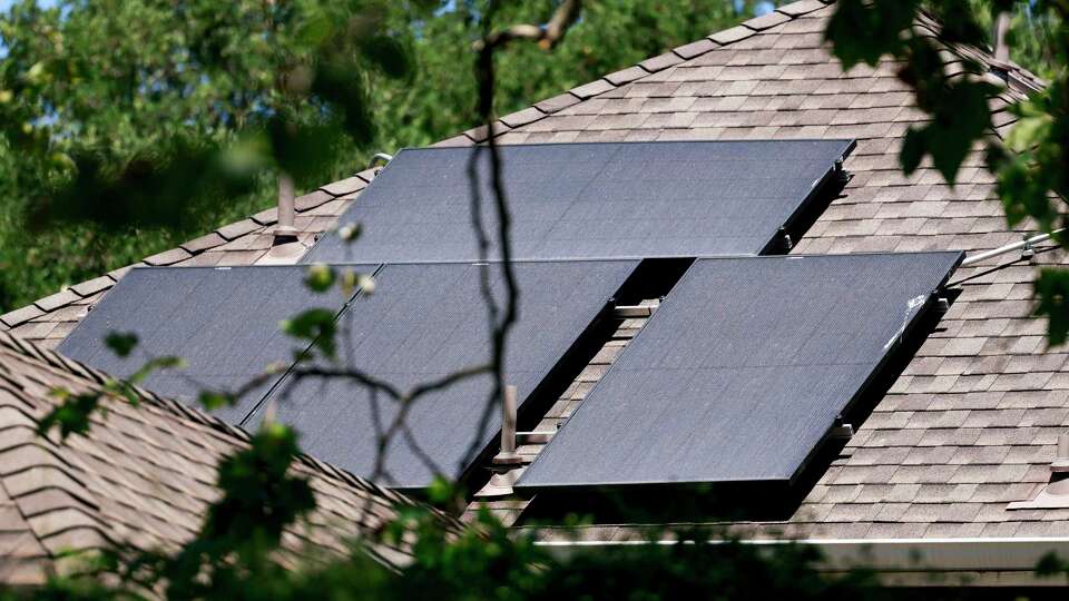 Solar panels are seen on the roof of a home in San Anselmo, Calif. Thursday, Aug. 15, 2024.