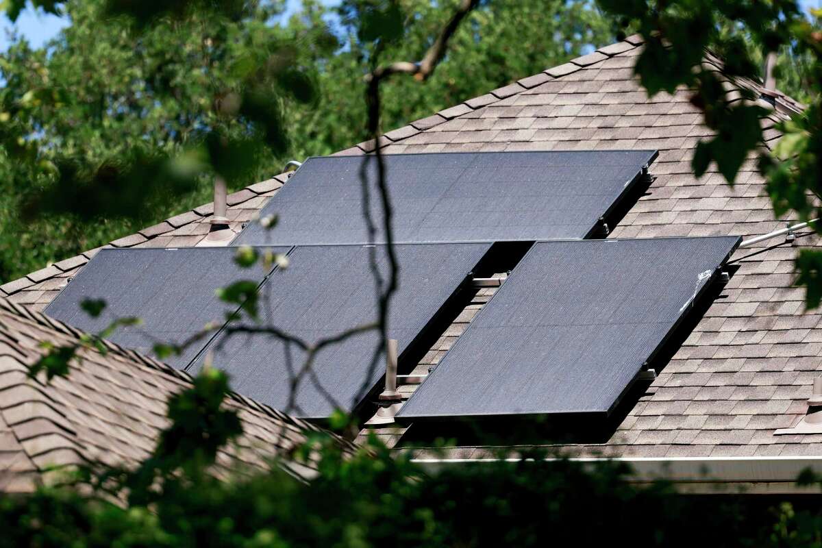 Solar panels are seen on the roof of a home in San Anselmo, Calif. Thursday, Aug. 15, 2024.