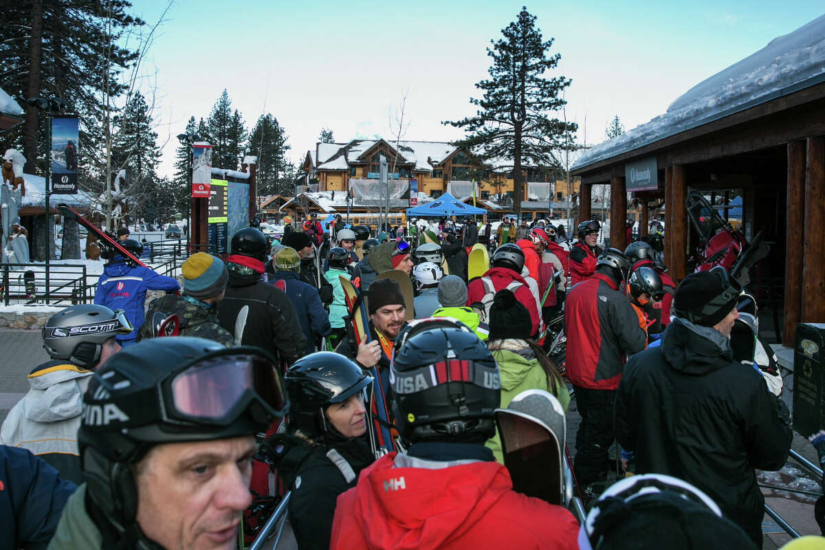 FILE: Skiers crowd in line to enter a gondola lift to the top of Heavenly Mountain ski resort in South Lake Tahoe, California.