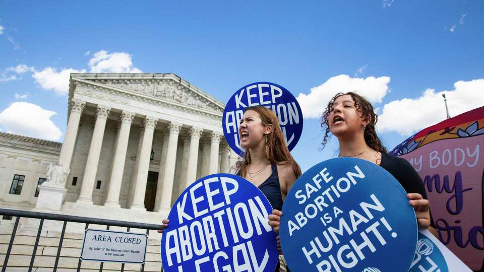 Abortion rights activists are chanting and showing signs when abortion rights activists are protesting in front of the US Supreme Court in Washington, DC on June 24, 2024. This demonstration marks the second anniversary of the court's Dobbs v. Jackson Women's Health Organization ruling, which reversed federal protections for access to abortions. (Photo by Aashish Kiphayet / Middle East Images / Middle East Images via AFP)