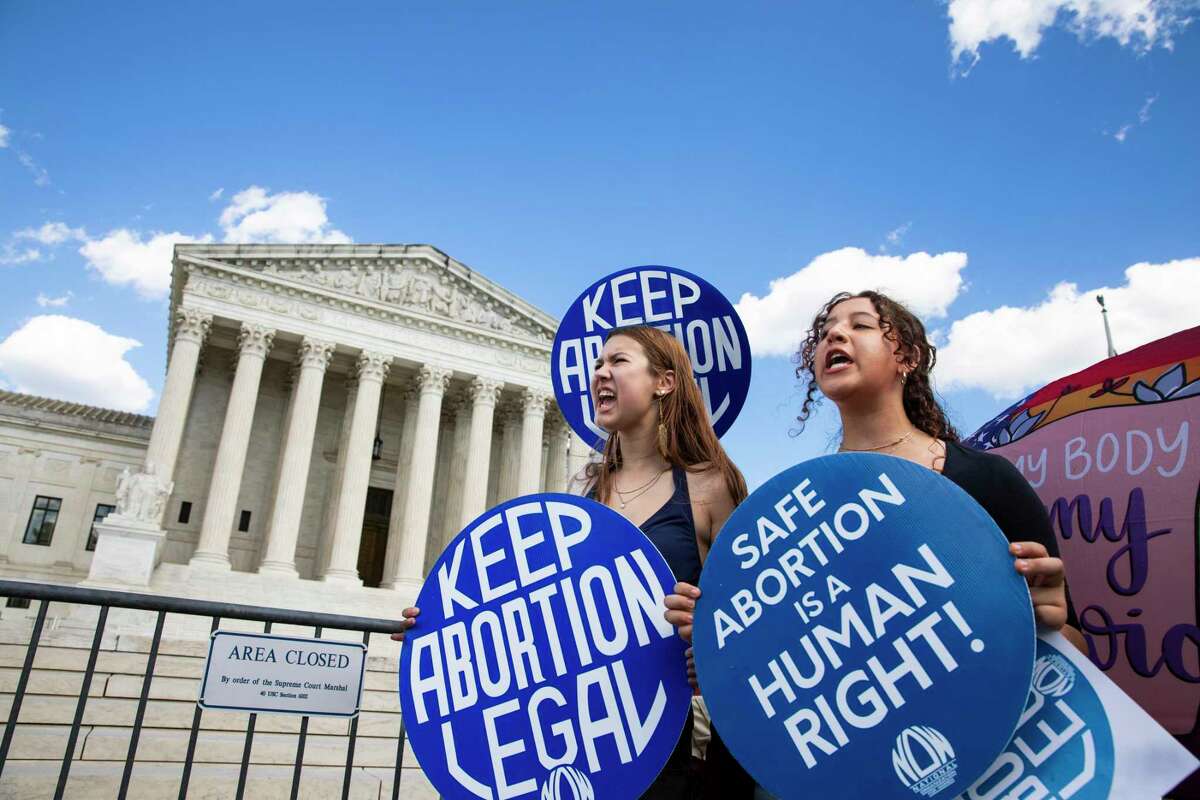 Abortion rights activists are chanting and showing signs when abortion rights activists are protesting in front of the US Supreme Court in Washington, DC on June 24, 2024. This demonstration marks the second anniversary of the court's Dobbs v. Jackson Women's Health Organization ruling, which reversed federal protections for access to abortions. (Photo by Aashish Kiphayet / Middle East Images / Middle East Images via AFP)