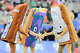 The Pop-Tart mascots shake hands prior to the 2024 Pop-Tarts Bowl between the Miami Hurricanes and the Iowa State Cyclones at Camping World Stadium on December 28, 2024 in Orlando, Florida.