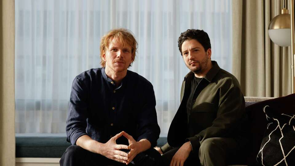 Filmmaker Tim Fehlbaum, left to right, director of “September 5”, and actor John Magaro, who plays the character of Geoffrey Mason in September 5, sit for a portrait on Friday, December 6, 2024 in San Francisco, Calif. “September 5” is an Oscar-contender about ABC Sports' coverage of the Israeli hostage tragedy at the 1972 Munich Olympics. Film opens on Jan. 10 in San Francisco.