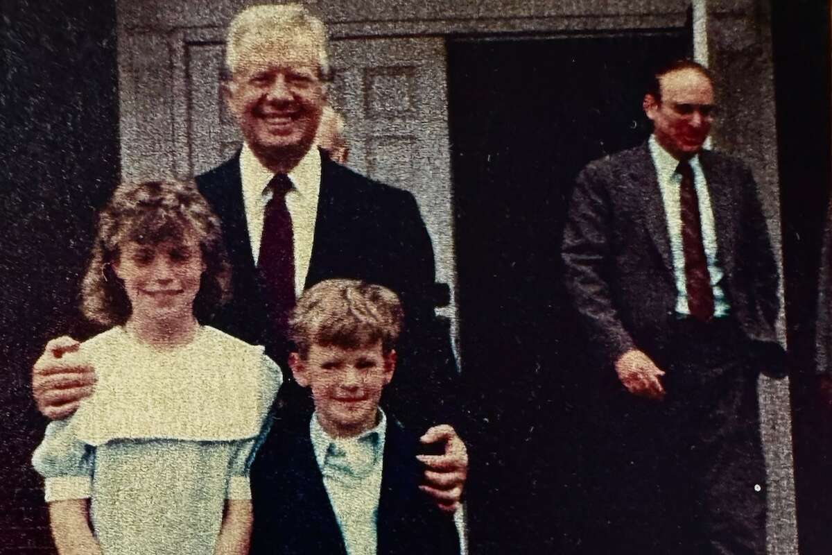 ONE TIME USE ONLY FOR CARTER1231: The author and her brother stand with President Jimmy Carter at Maranatha Baptist Church in Plains, GA in 1985.