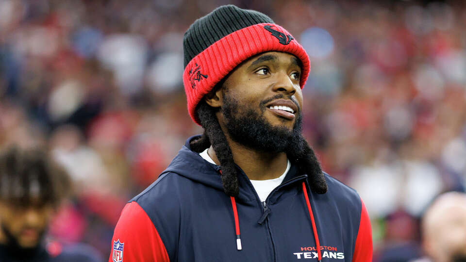 Wide receiver Diontae Johnson #18 of the Houston Texans stands on the sidelines during the national anthem prior to an NFL football game against the Baltimore Ravens, at NRG Stadium on December 25, 2024 in Houston, Texas. (Photo by Brooke Sutton/Getty Images)