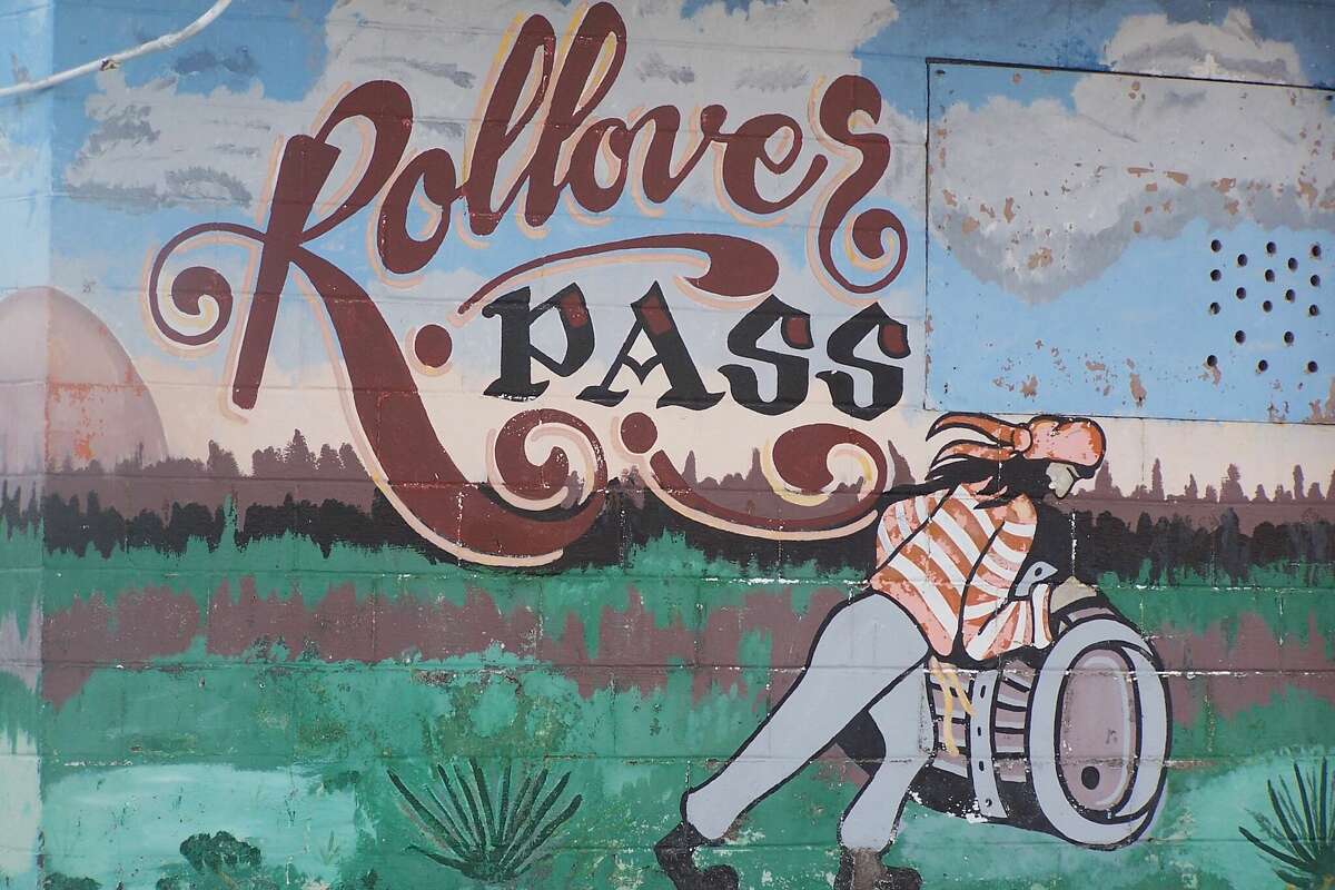 This sign on a long-gone bait shop near Rollover Pass testifies to the high esteem anglers once held for the tiny strip of Bolivar Peninsula.