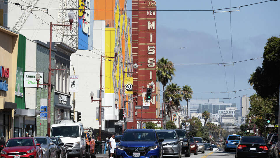 Traffic transits along Mission Street in San Francisco’s Mission district on Friday, Aug. 30, 2024. 